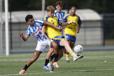 312098