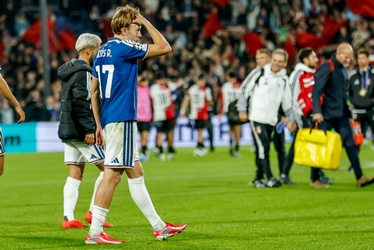 320853
